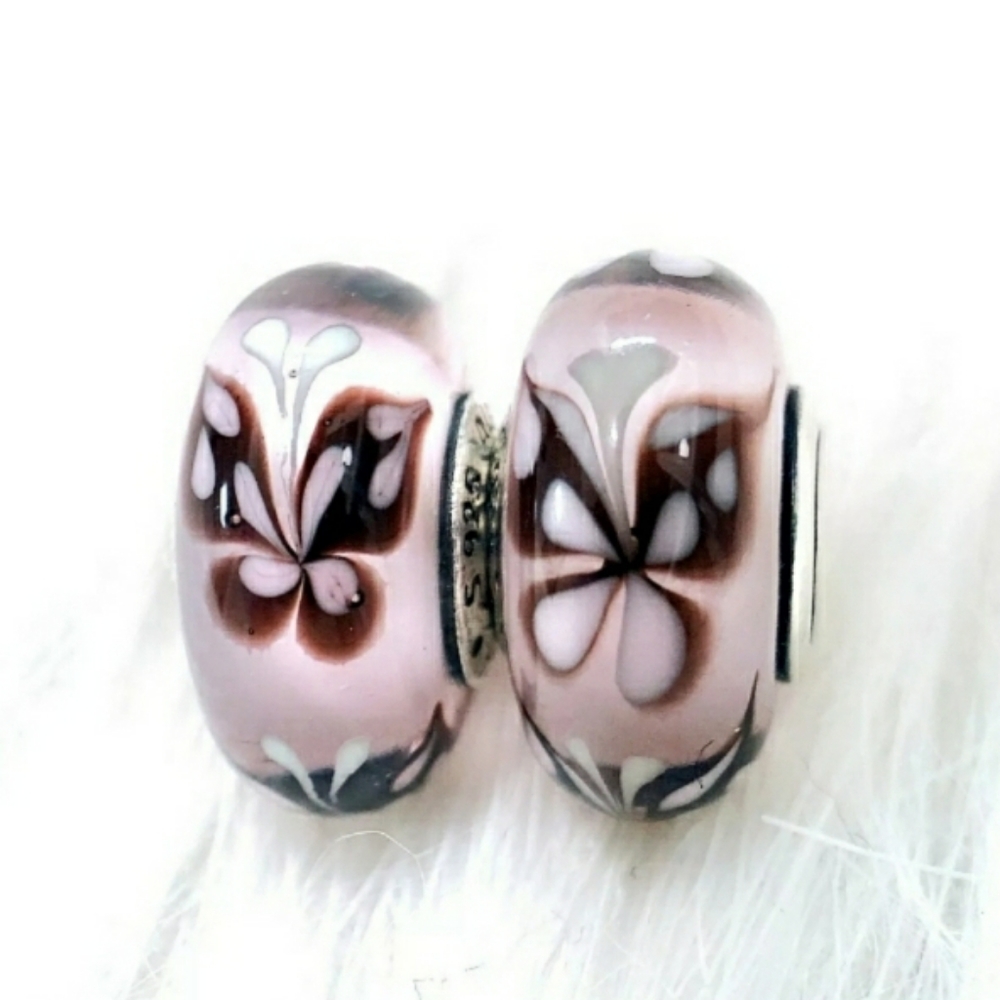 Pandora pair of pink butterfly kisses Muranos.